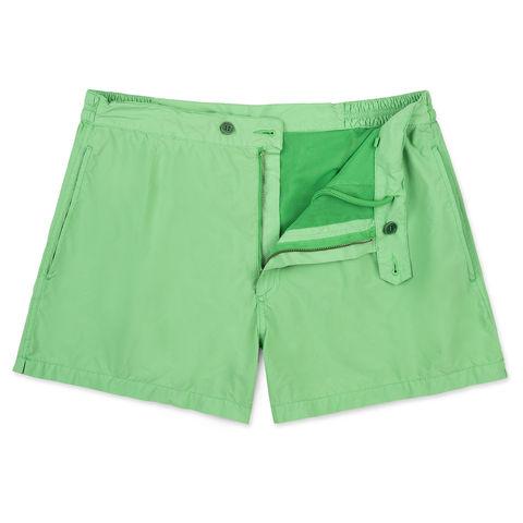 Costume verde a gamba corta con rete interna, elastico sui fianchi e tasche laterali